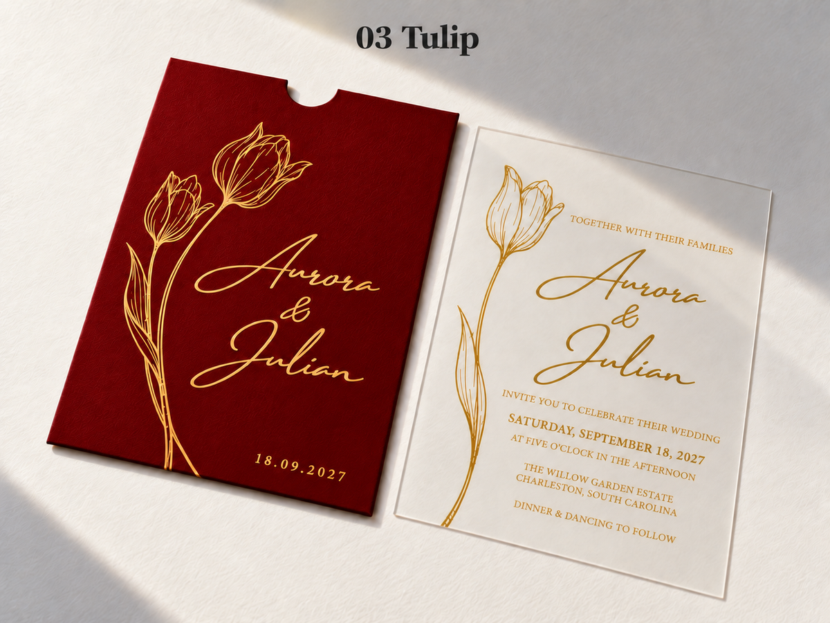 Tulip invitation with a red pocket sleeve, gold flower artwork and script, and a matching clear card.