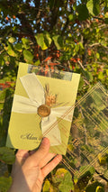 Clear Acrylic Wedding Invitation with Gold Print, Light Green Envelope, White Ribbon, Gold Wax Seal & Dried Flowers - LunaInvites